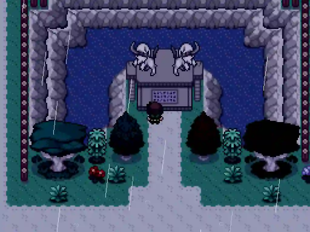 An image of a statue of two Absol in a garden. A pond surrounds the statues besides the walkway leading to them.