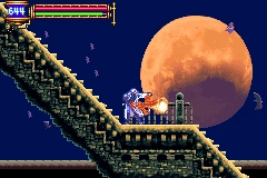 An image of Soma Cruz from Castlevania: Aria of Sorrow tossing forward some fireballs.